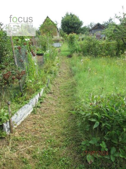 Predám záhradu so studňou a chatkou
