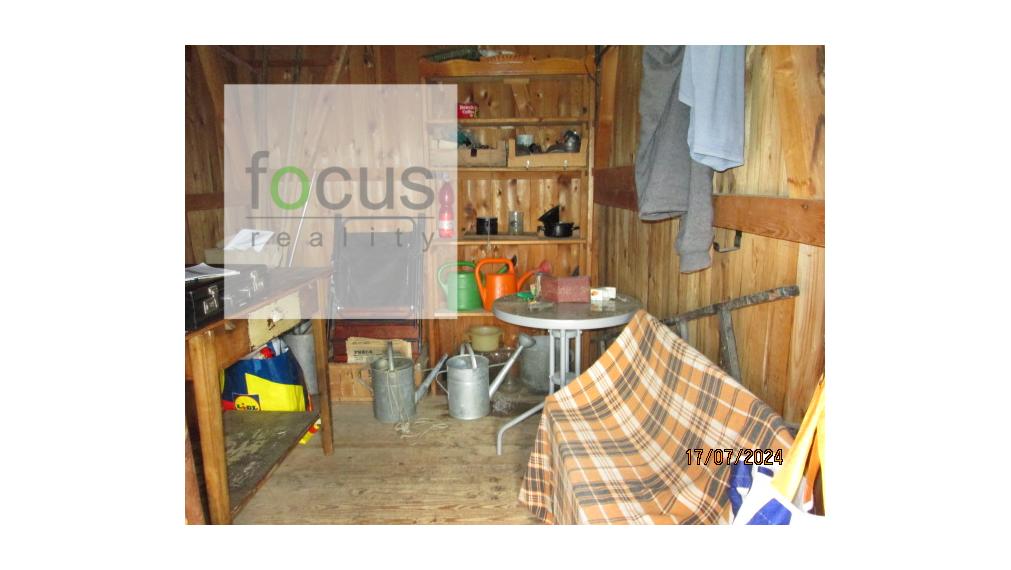 Predám záhradu so studňou a chatkou